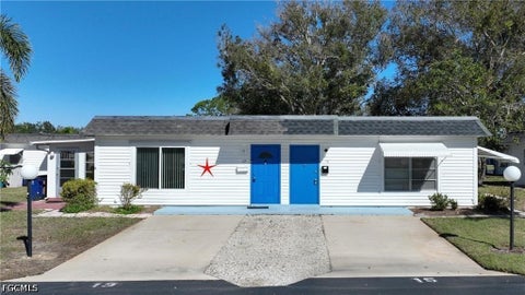 Photo of 13 Hamlin Court, Lehigh Acres, FL 33936 (MLS # 2026039547)