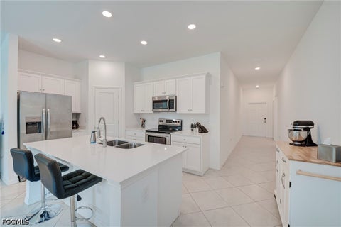 Tiny photo for 420 Paddock Street, Lehigh Acres, FL 33974 (MLS # 2026043959)
