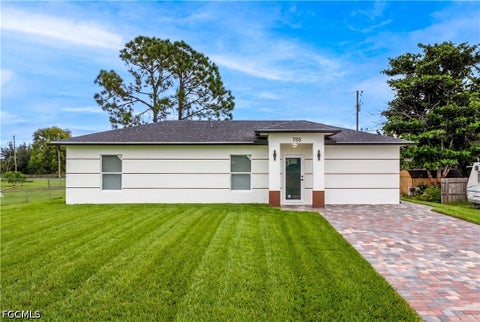 Photo of 755 Fleming Avenue S, Lehigh Acres, FL 33974 (MLS # 2026041116)