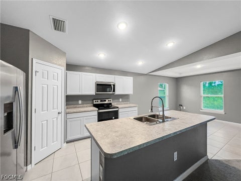 Photo of 3107 35th Street W, Lehigh Acres, FL 33971 (MLS # 2026039349)