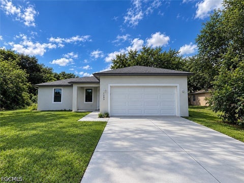 Photo of 505 Columbus Boulevard NW, Lehigh Acres, FL 33974 (MLS # 2026042166)