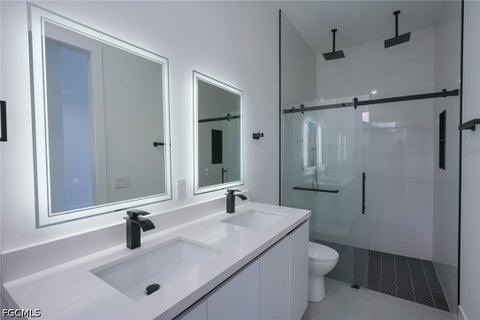Tiny photo for 5 SW 26th Place, Cape Coral, FL 33991 (MLS # 2026039087)