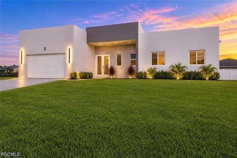 Photo of 5 SW 26th Place, Cape Coral, FL 33991 (MLS # 2026039087)
