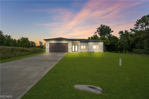 Photo of 3416 23rd Street SW, Lehigh Acres, FL 33976 (MLS # 2026039397)