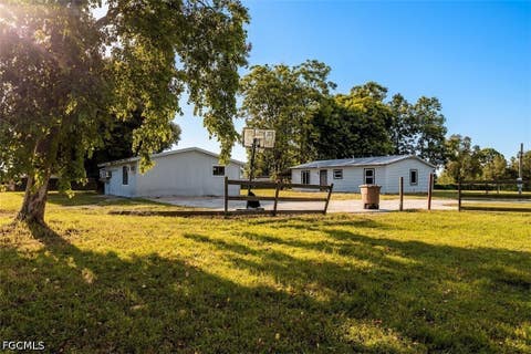 Photo of 1659 Crescent Avenue, Labelle, FL 33935 (MLS # 2026035647)