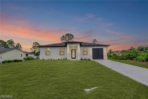 Photo of 2807 6th Street SW, Lehigh Acres, FL 33976 (MLS # 2026038282)