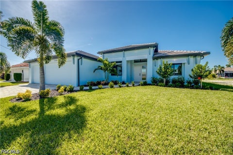 Photo of 1148 SW 39th Street, Cape Coral, FL 33914 (MLS # 2026038986)