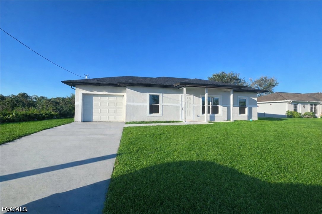 Photo 1 of 18 — 1248 Hillcrest Street E, Lehigh Acres, FL 33974