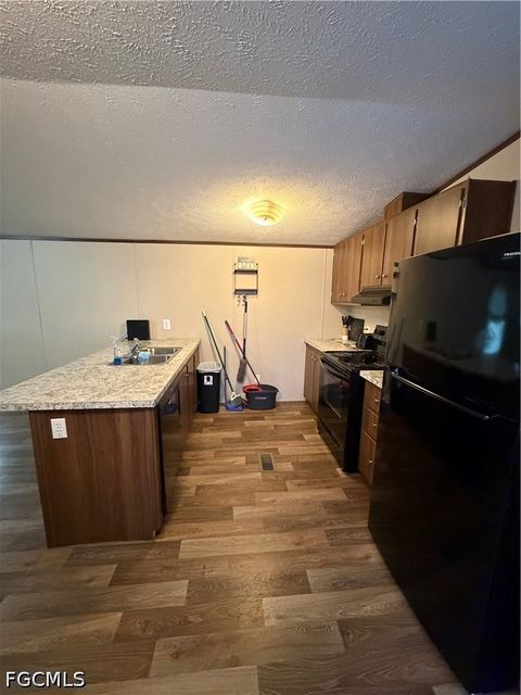 Tiny photo for 631 Stanton Street, Clewiston, FL 33440 (MLS # 2026020357)