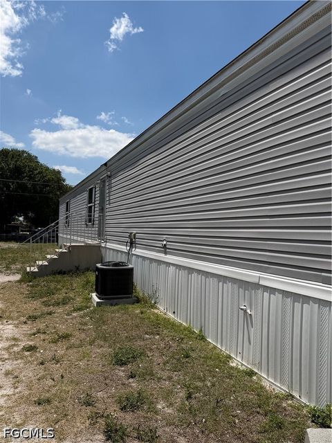 Tiny photo for 631 Stanton Street, Clewiston, FL 33440 (MLS # 2026020357)