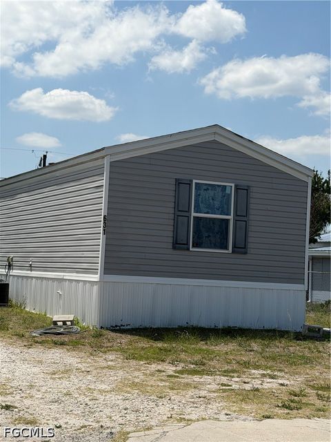 Photo of 631 Stanton Street, Clewiston, FL 33440 (MLS # 2026020357)