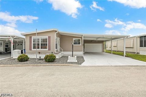 Photo of 487 Jacklin Lane, North Fort Myers, FL 33903 (MLS # 2026028355)