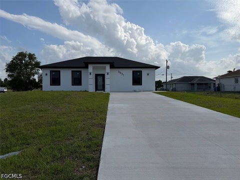 Photo of 3931 Sunset Road, Lehigh Acres, FL 33971 (MLS # 2026037683)