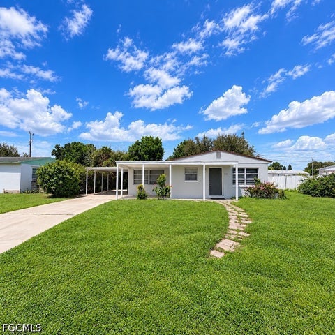 Photo of 1111 Cherokee Avenue, Lehigh Acres, FL 33936 (MLS # 2026039257)