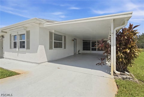 Photo of 7 Dutch Iris Lane, Lehigh Acres, FL 33936 (MLS # 2026038803)