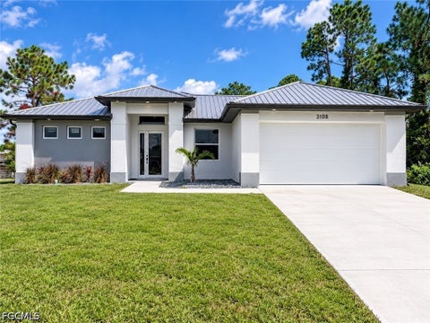 Photo of 3108 19th Street SW, Lehigh Acres, FL 33976 (MLS # 2026037646)
