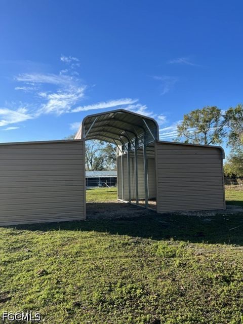Tiny photo for 826 B Road, Labelle, FL 33935 (MLS # 2026020441)