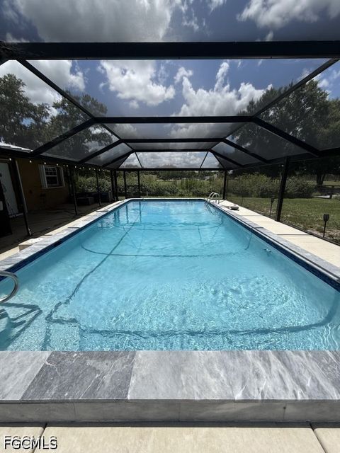 Tiny photo for 826 B Road, Labelle, FL 33935 (MLS # 2026020441)