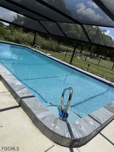 Tiny photo for 826 B Road, Labelle, FL 33935 (MLS # 2026020441)