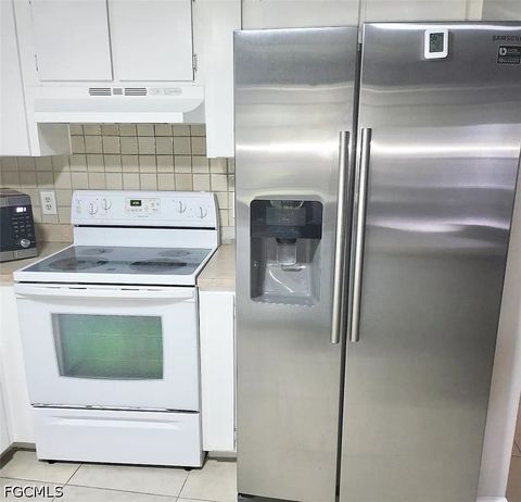 Tiny photo for 506 SE 26th Street, Cape Coral, FL 33904 (MLS # 2026020513)