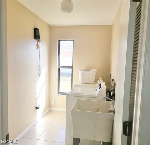 Tiny photo for 506 SE 26th Street, Cape Coral, FL 33904 (MLS # 2026020513)
