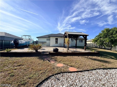 Tiny photo for 3445 NE 11th Avenue, Cape Coral, FL 33909 (MLS # 2026039585)