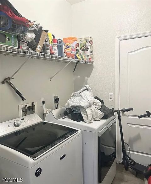 Tiny photo for 221 NW 3rd Place, Cape Coral, FL 33993 (MLS # 2026020241)
