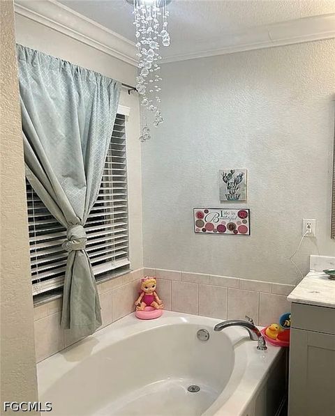 Tiny photo for 221 NW 3rd Place, Cape Coral, FL 33993 (MLS # 2026020241)