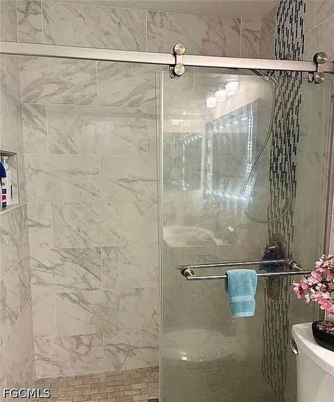 Tiny photo for 221 NW 3rd Place, Cape Coral, FL 33993 (MLS # 2026020241)
