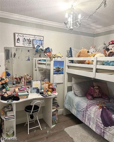 Tiny photo for 221 NW 3rd Place, Cape Coral, FL 33993 (MLS # 2026020241)