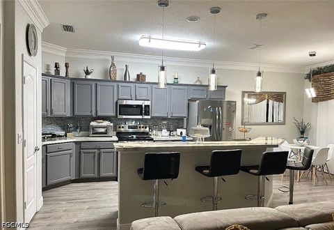 Tiny photo for 221 NW 3rd Place, Cape Coral, FL 33993 (MLS # 2026020241)