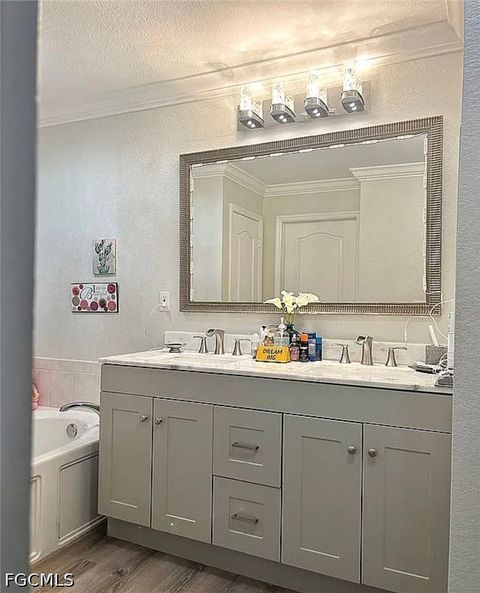Tiny photo for 221 NW 3rd Place, Cape Coral, FL 33993 (MLS # 2026020241)