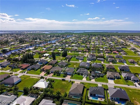 Tiny photo for 113 SW 33rd Place, Cape Coral, FL 33991 (MLS # 2026037127)