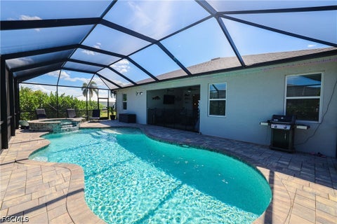 Tiny photo for 113 SW 33rd Place, Cape Coral, FL 33991 (MLS # 2026037127)