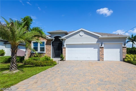 Tiny photo for 113 SW 33rd Place, Cape Coral, FL 33991 (MLS # 2026037127)
