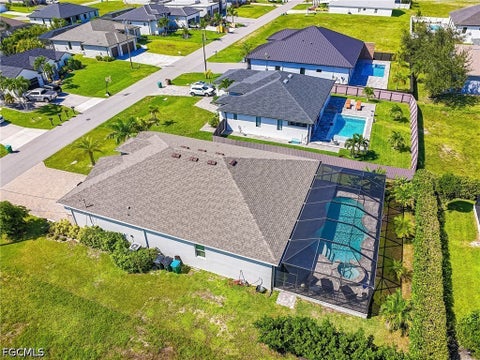 Tiny photo for 113 SW 33rd Place, Cape Coral, FL 33991 (MLS # 2026037127)