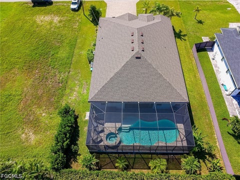 Tiny photo for 113 SW 33rd Place, Cape Coral, FL 33991 (MLS # 2026037127)