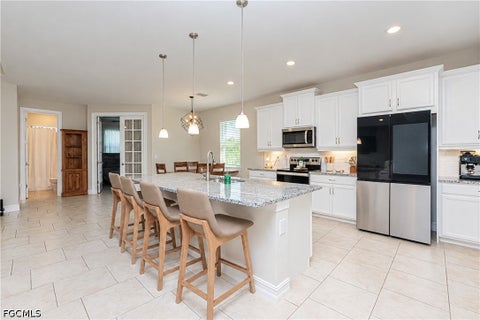 Tiny photo for 113 SW 33rd Place, Cape Coral, FL 33991 (MLS # 2026037127)