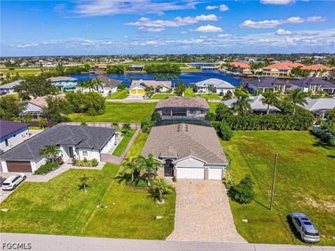 Tiny photo for 113 SW 33rd Place, Cape Coral, FL 33991 (MLS # 2026037127)