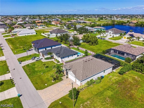 Tiny photo for 113 SW 33rd Place, Cape Coral, FL 33991 (MLS # 2026037127)