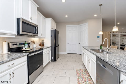 Tiny photo for 113 SW 33rd Place, Cape Coral, FL 33991 (MLS # 2026037127)