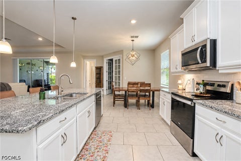 Tiny photo for 113 SW 33rd Place, Cape Coral, FL 33991 (MLS # 2026037127)