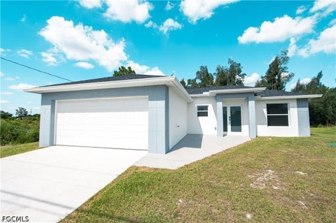 Photo of 2712 46th Street SW, Lehigh Acres, FL 33976 (MLS # 2026039615)