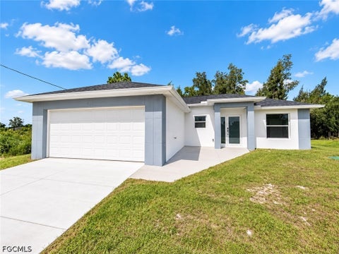 Photo of 2712 46th Street SW, Lehigh Acres, FL 33976 (MLS # 2026039615)