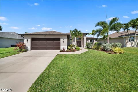 Photo of 3716 SW 11th Place, Cape Coral, FL 33914 (MLS # 2026034579)
