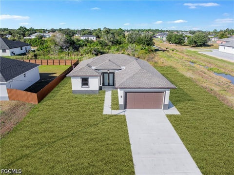 Photo of 4700 DORA Avenue S, Lehigh Acres, FL 33974 (MLS # 2026041385)