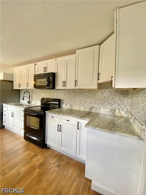 Tiny photo for 106 Leeland Heights Boulevard W, Lehigh Acres, FL 33936 (MLS # 2026022234)