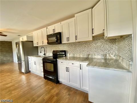 Tiny photo for 106 Leeland Heights Boulevard W, Lehigh Acres, FL 33936 (MLS # 2026022234)