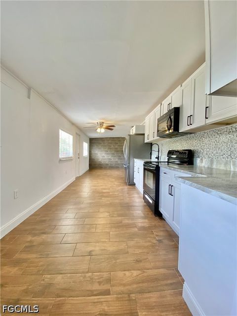 Tiny photo for 106 Leeland Heights Boulevard W, Lehigh Acres, FL 33936 (MLS # 2026022234)