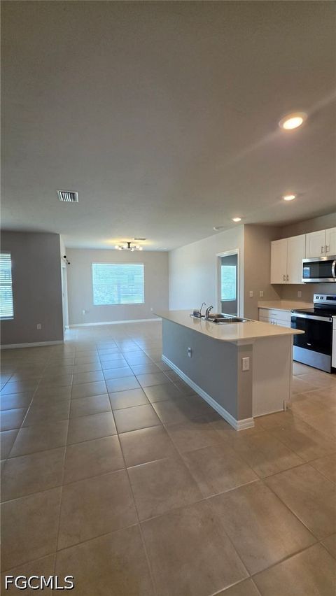 Tiny photo for 1437 NW 31st Place, Cape Coral, FL 33993 (MLS # 2026021682)